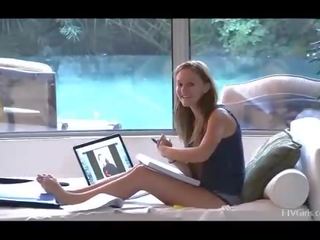 Summer splendid young blonde amateur posing and painting toenails