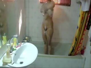 A cute Big Boobed Slim lady Is Taking A Bath In