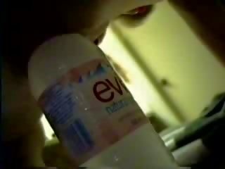 A bottle of purified water brings her to orgasm show