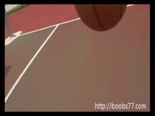 Pleasant chica Juggs out on basketball court