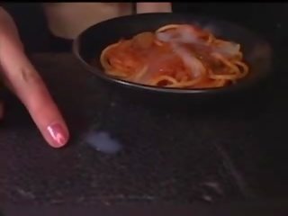 Japanese young lady eats spaghetti with cum